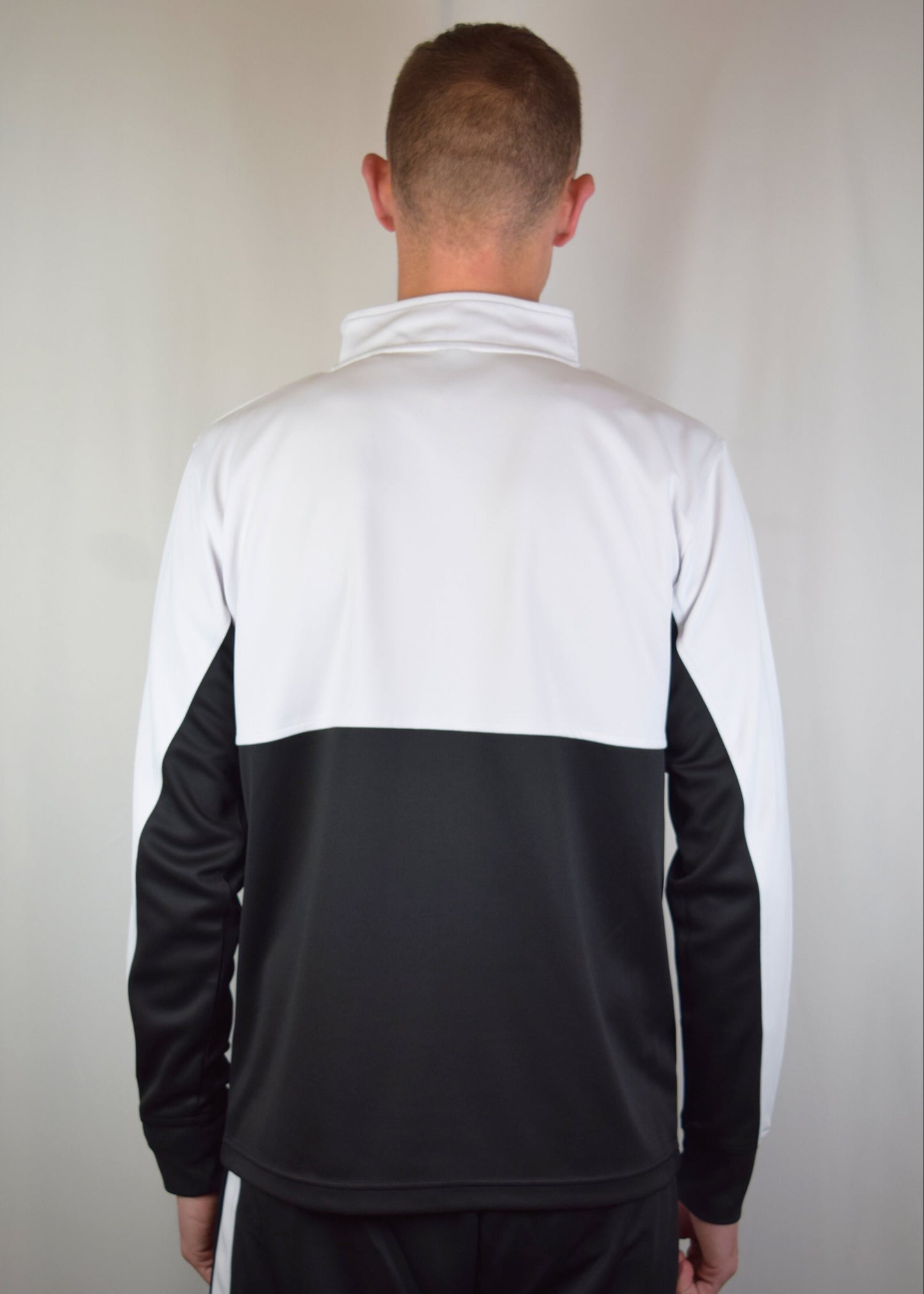 The Flow Track Quarter Zip
