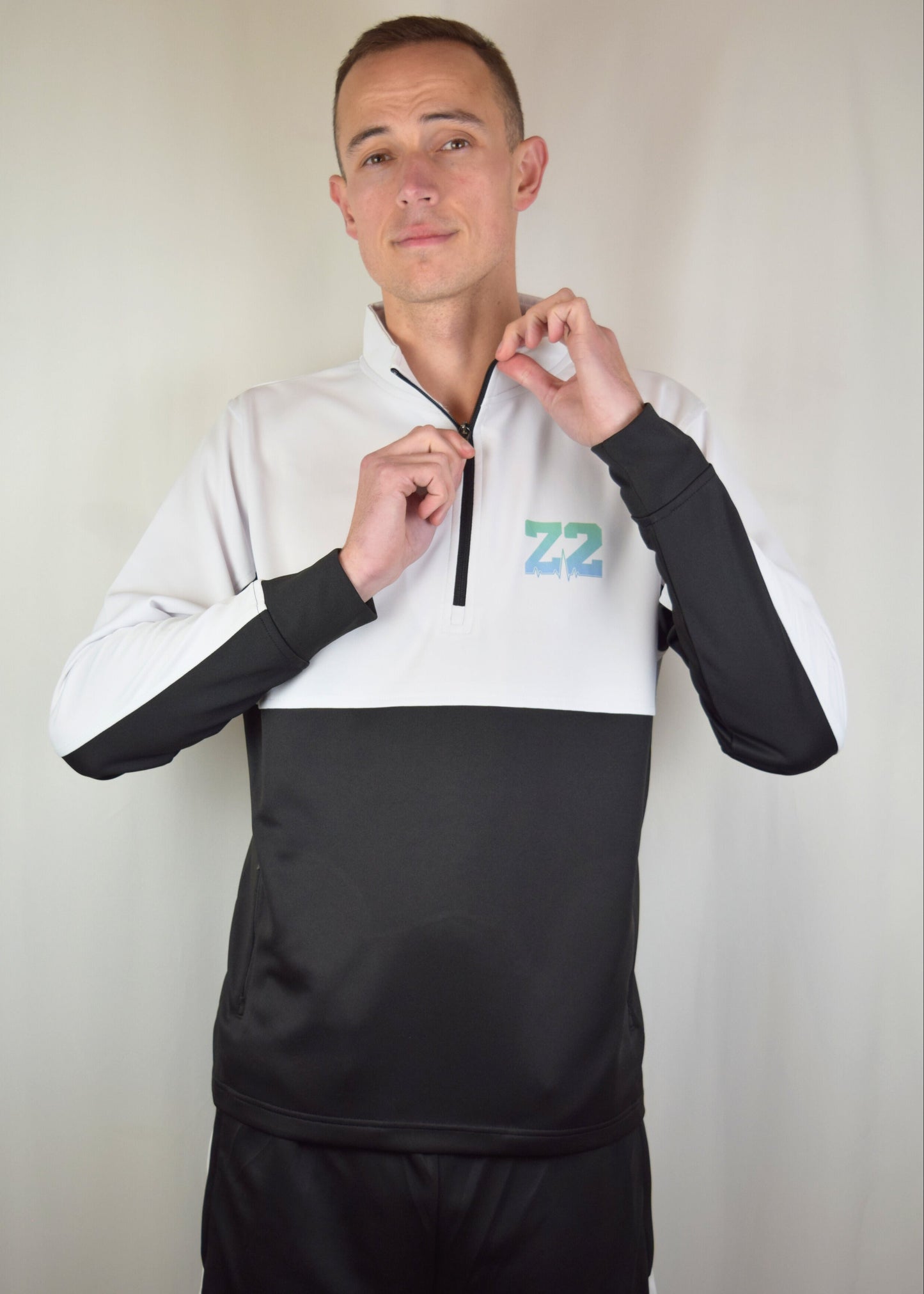 The Flow Track Quarter Zip