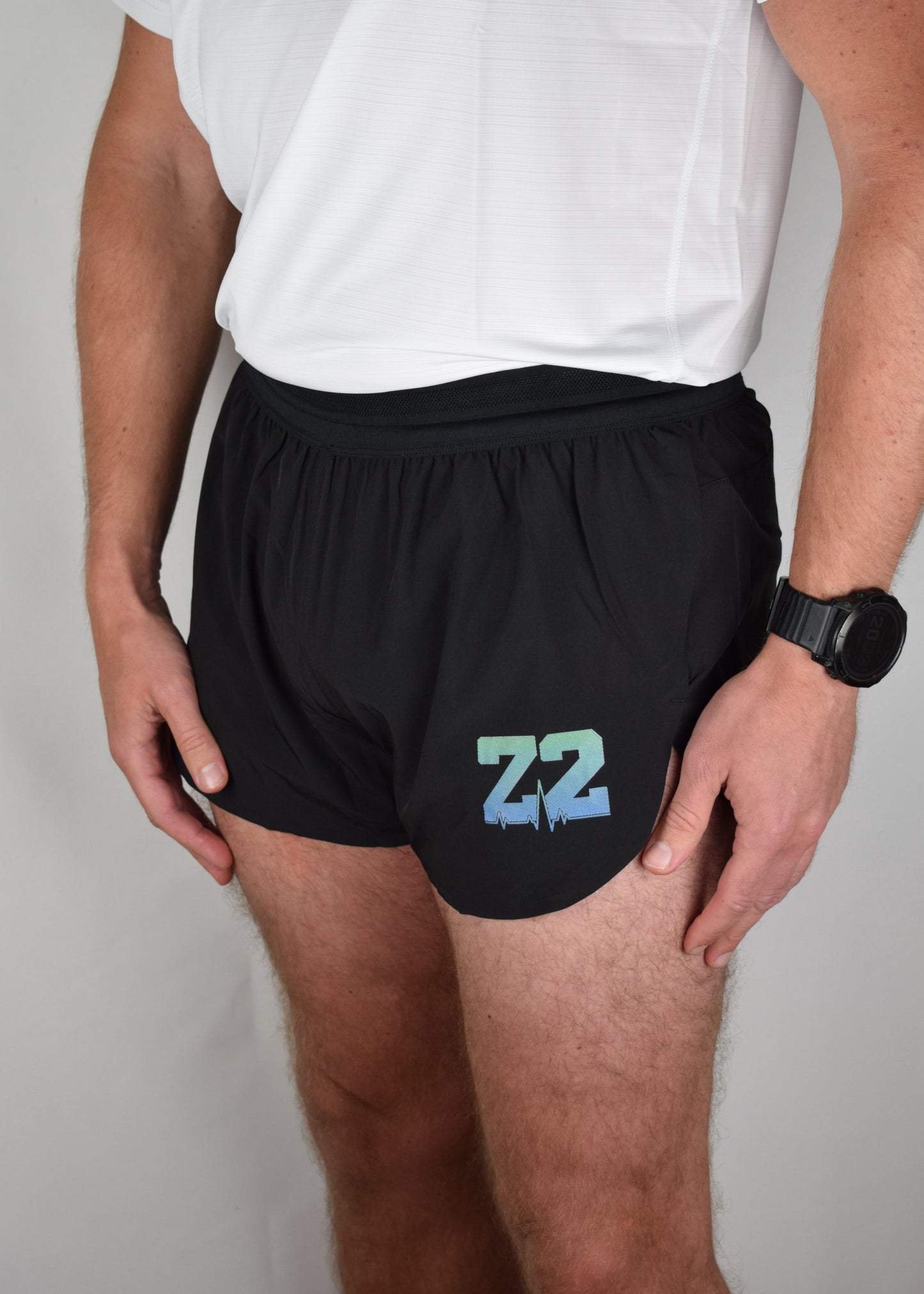 Stride 4 inch running performance shorts in black, facing 45 degrees