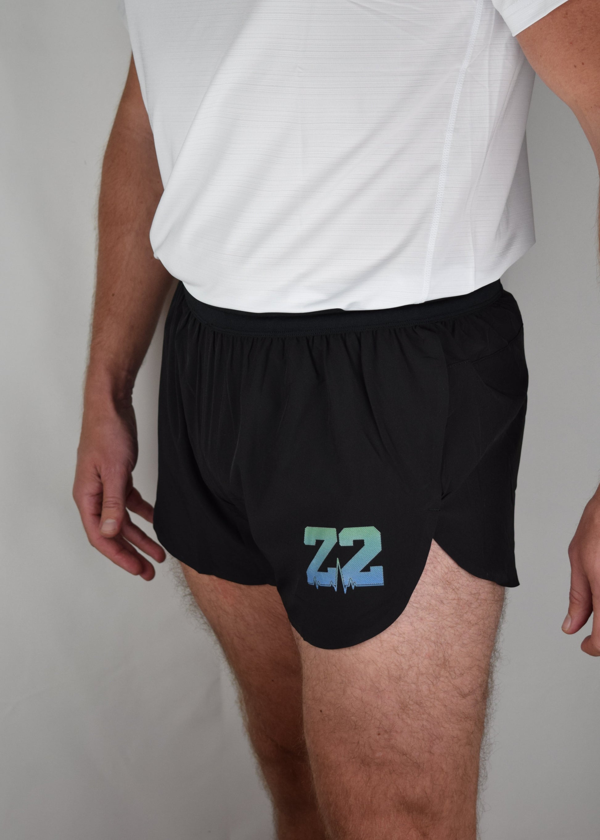 Stride 4 inch running performance shorts in black, facing 45 degrees
