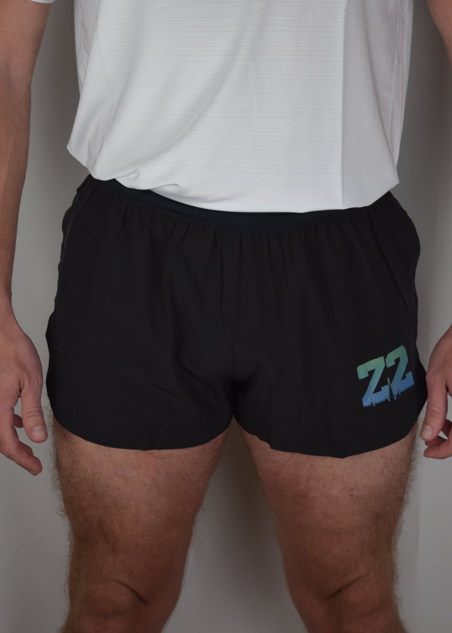 Short running performance shorts in black, facing forward