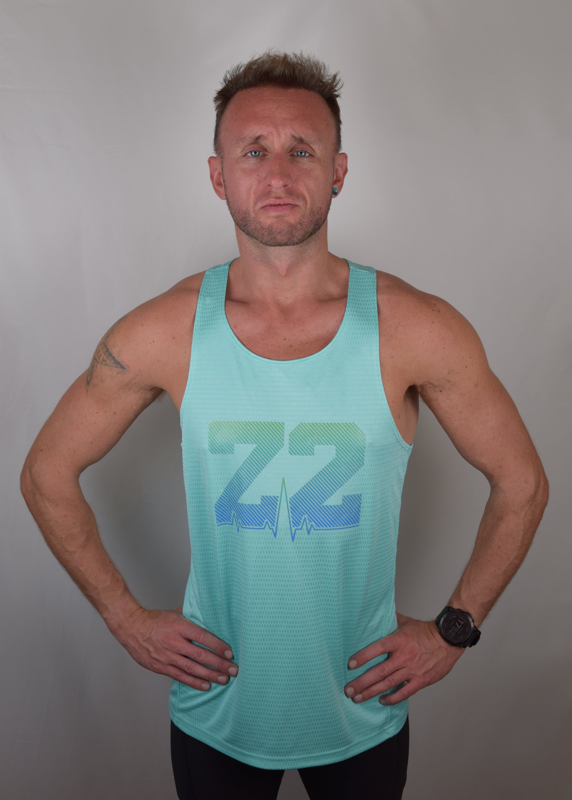 The win technical running vest in turquoise from the front